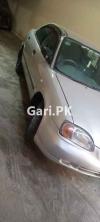 Suzuki Baleno JXL 2004 For Sale in Lahore