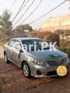 Toyota Corolla GLI 2010 For Sale in silver colour with Genuine bannet