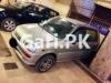 Daihatsu Cuore  2012 For Sale in Pakistan Quarters