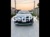 Toyota Corolla Axio Hybrid 1.5 2015 For Sale in Mardan