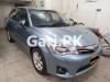 Toyota Corolla Axio Hybrid 1.5 2014 For Sale in Karachi