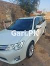 Toyota Corolla Axio Hybrid 1.5 2014 For Sale in Peshawar