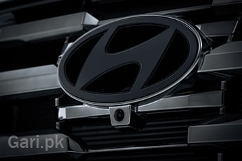 Hyundai Tucson Hybrid 2025 Exterior Front Logo with Front Camera Hyundai Tucson Hybrid 2025 Exterior Front Logo with Front Camera