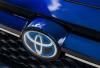 Toyota Plans to Swap Blue Hybrid Emblem for a Dot